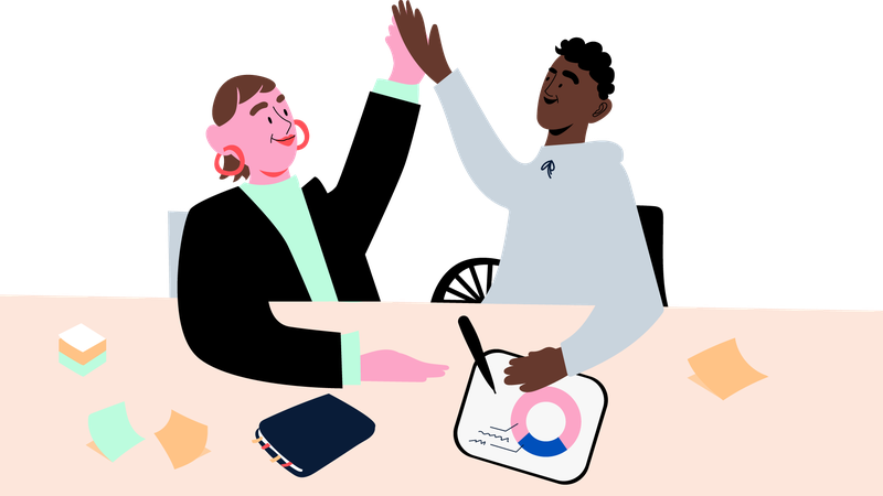 Kaksi ihmistä lyö high fiven työpöydän ääressä, piirroskuva.