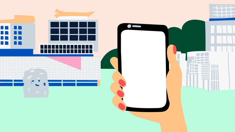 Älypuhelinta pitelevä käsi nurmikentän ja rakennusten edessä, piirroskuva.